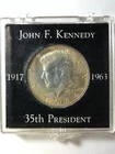 1964-D Silver Kennedy Half Dollar uncirculated in case.