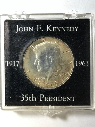 1964-D Silver Kennedy Half Dollar uncirculated in case.