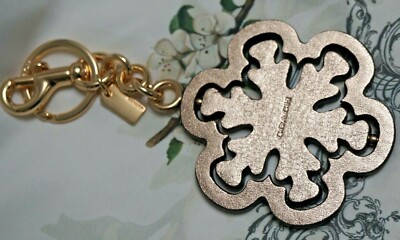 Coach Spinning Snowflake Bag Charm in Signature Canvas C1754