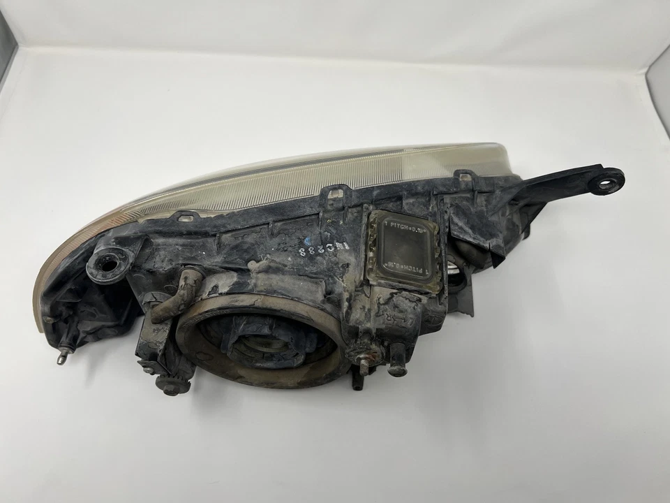 Compuesto de faro izquierdo del conductor para 98-01 GEO CHEVY METRO FIREFLY OEM Foto 3 de 4