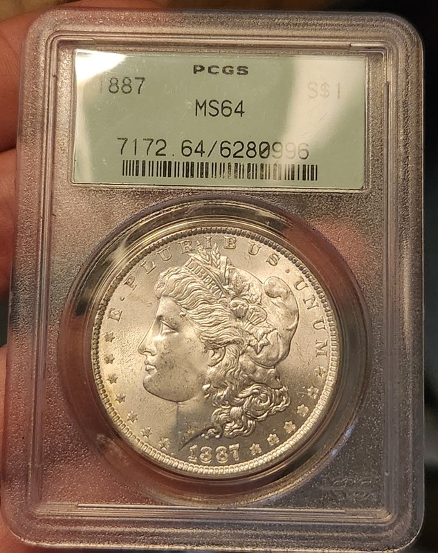 1887 Morgan Silver Dollar MS64 PCGS OGH