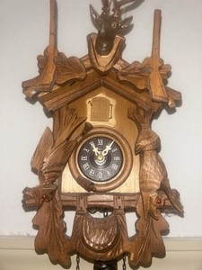Black Forest Wooden Cuckoo Clock Deer Head Animal Theme Roman Numerals Pendulum