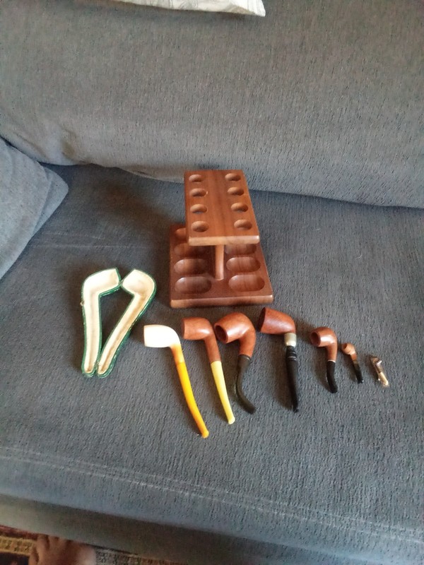 lot of smoking vintage pipes