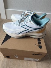 diadora Mythos Blushield 9 Vortice Running Womens Green, White Sneakers Size 7