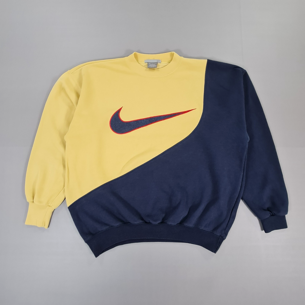 navy blue and yellow nike sweatsuit