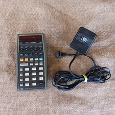 HP 65 calculator with charger and battery