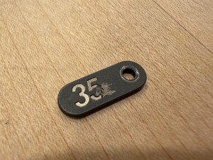 OEM Battle Black 35th Anniversary Tab for Rick Hinderer RHK