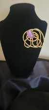 AVON VINTAGE GOLD TONE BROOCH WITH PURPLE GLASS CABOHON 1990's  3"X2.75"