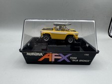 AURORA AFX 1909 FORD "BAJA BRONCO" YELLOW HO Slot Car IN ORIGINAL CUBE RARE