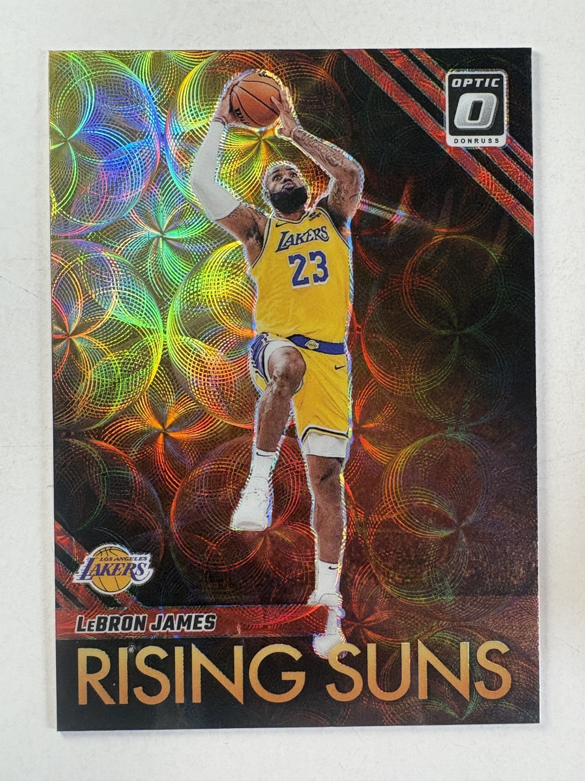 2023-24 Panini Donruss Optic Lebron James Rising Suns #3 Red Scope Prizm 
