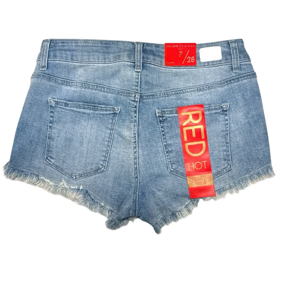 *Rosa famoso* Pantalones cortos de jean desgastados con dobladillo deshilachado para mujer talla 7/28 Foto 3 de 4