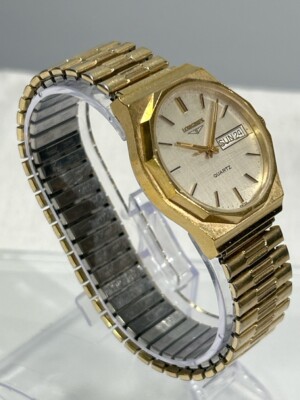 Longines ref. Q162D Quartz | Champagne Linen Dial on Gold tone