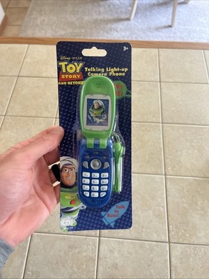Disney Toy Story BUZZ LIGHTYEAR Talking Light Up Flip Cell Phone