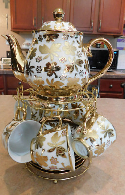 Honglida HD tea set 6 cups/saucers, teapot and metal rack