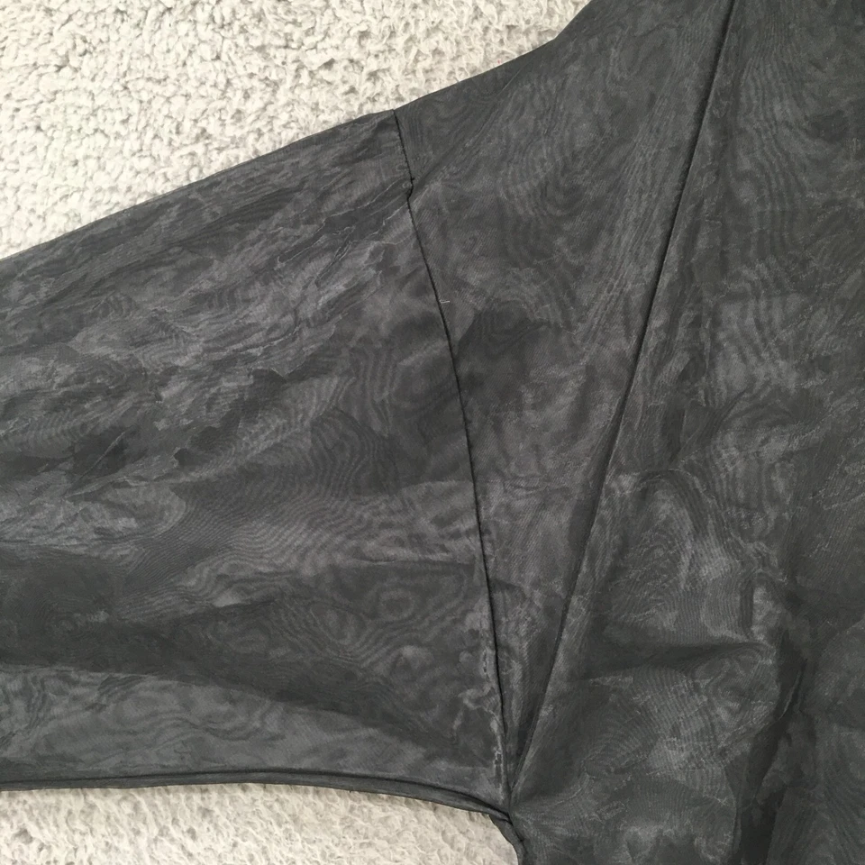 Chaqueta cortavientos Champion para hombre mediana negra cuello alto cremallera negra Foto 4 de 4