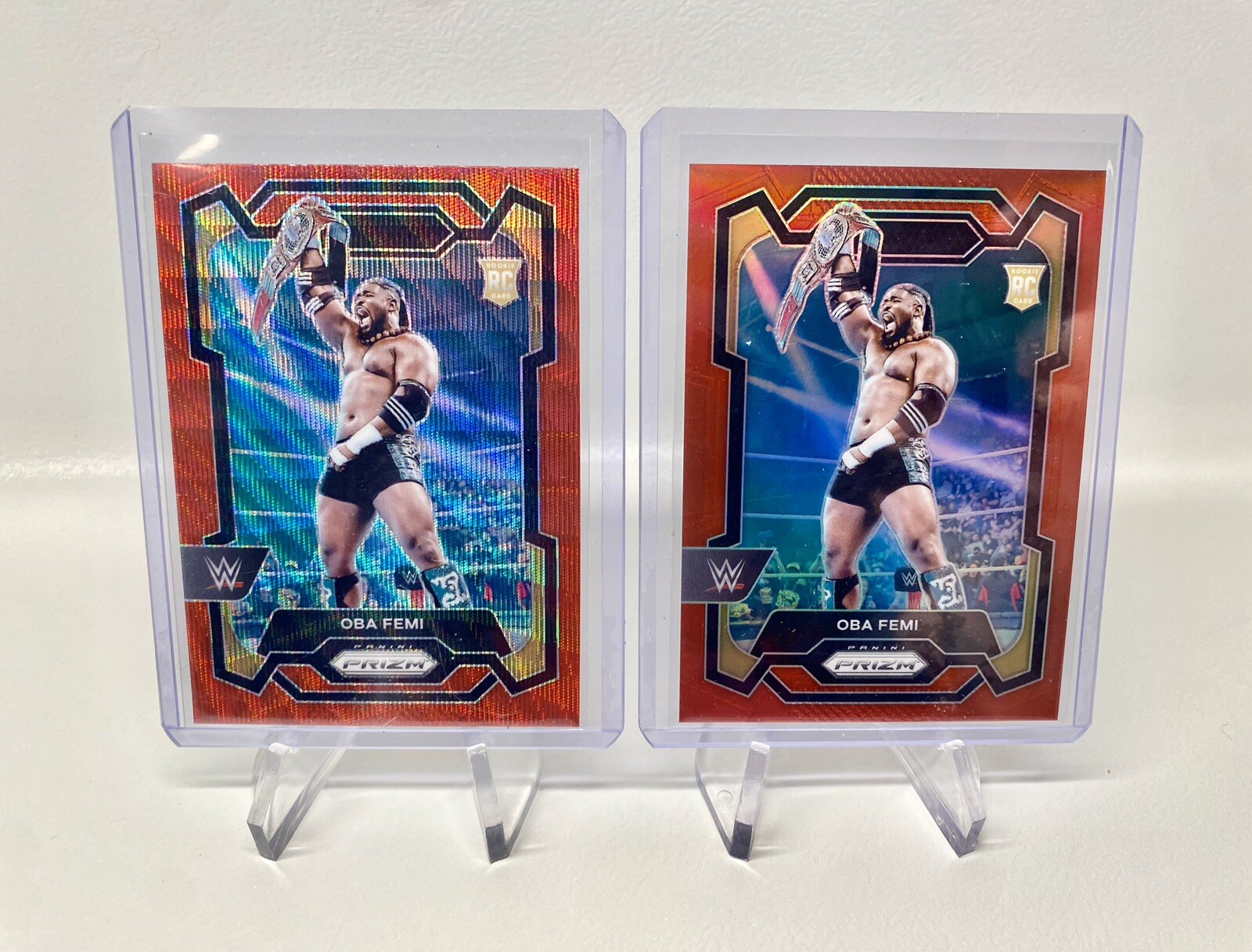 2024 WWE Panini Prizm OBA FEMI Red Prizm RC /299 & Red Wave Prizm RC