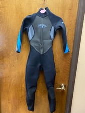 Unisex "XCEL" long black and blue wetsuit. Size 4.  Previously owned