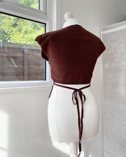 Brown cap sleeved tie back top 