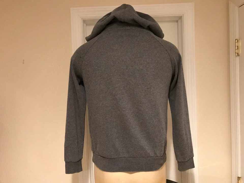 Chaqueta sudadera mediana Kim Kardashian Kollection para mujer con capucha y cremallera Foto 2 de 4