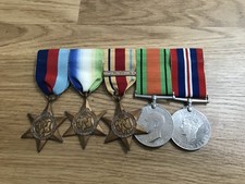 nice old lot 5 WW2 medal on a wearing bar 3 stars and 2 medals all in good shape