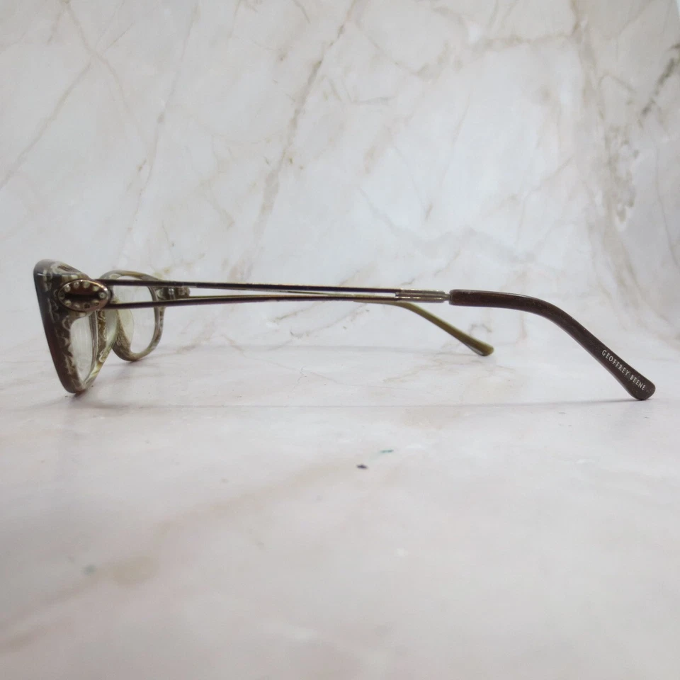 Marco de gafas Geoffrey Beene Brilliance para mujer de plástico marrón borde completo ovalado Foto 3 de 4