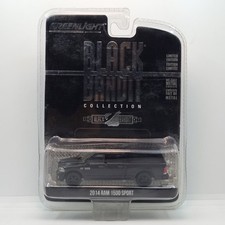GREENLIGHT BLACK BANDIT 2014 DODGE RAM 1500 SPORT W/ TOPPER HTF