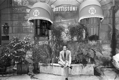 Italian dressmaker Gianni Battistoni posing in front of his atelie- Old Photo 1