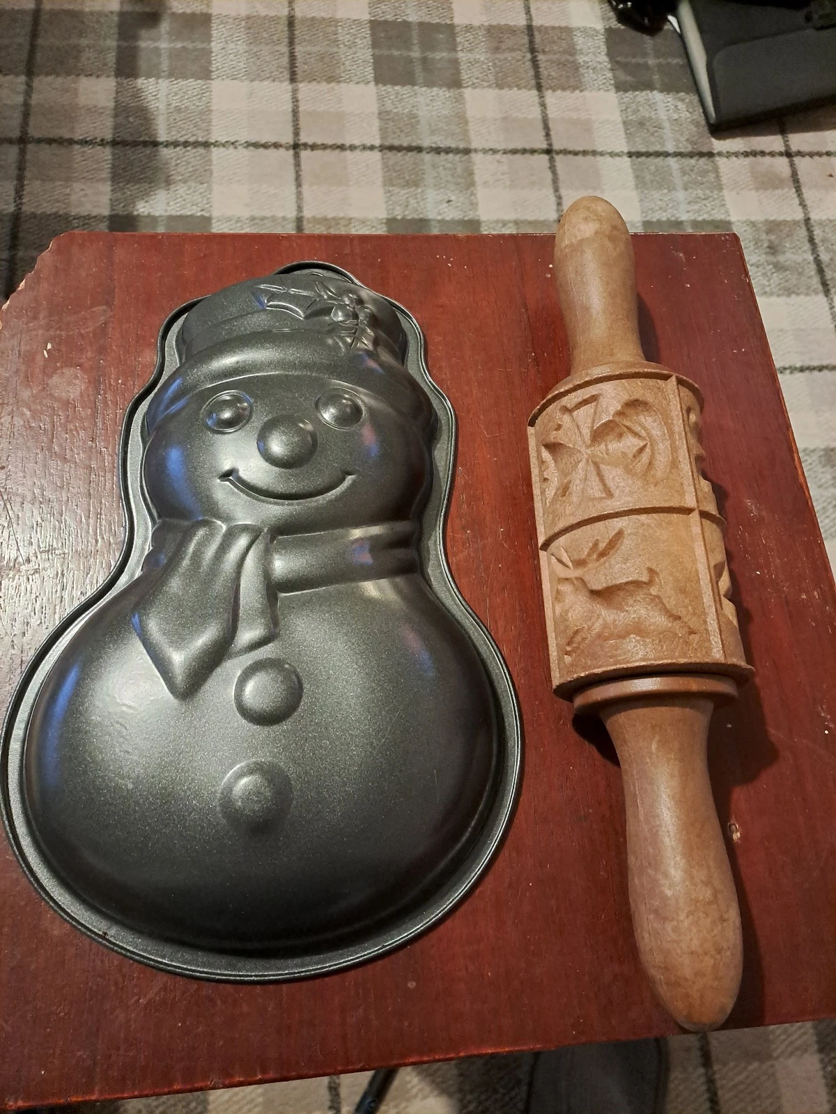 Carved wooden springerle rolling pin with festive designs + snowman baking mould