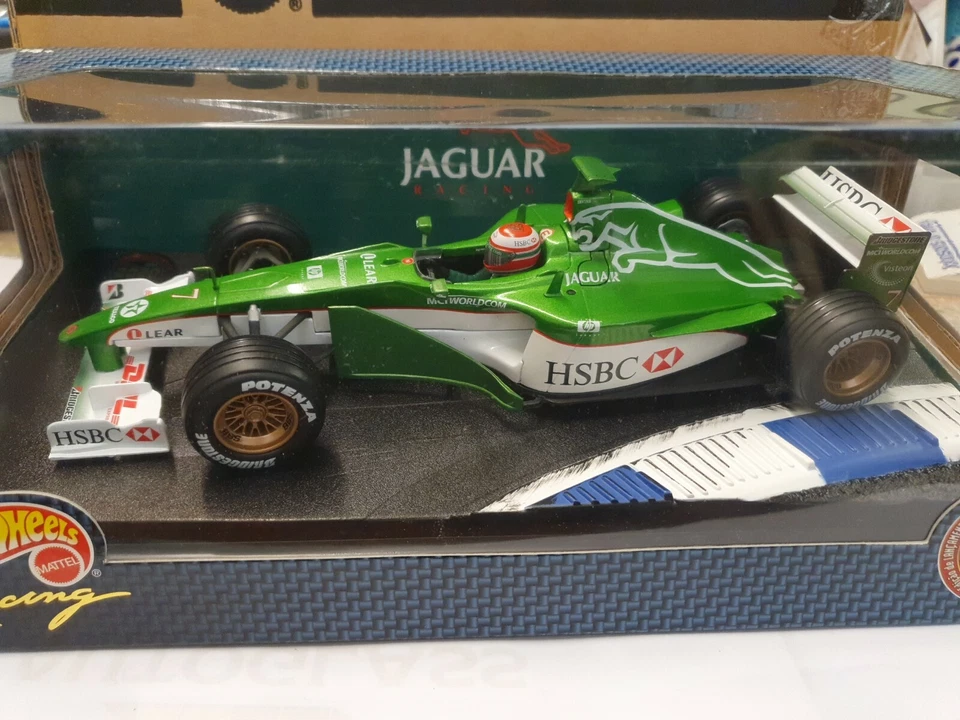Coche de lanzamiento Hotwheels 1:18 26699 Eddie Irvine Jaguar R1 2000 Foto 2 de 4