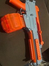 orby gun, used but in good condition comes with the standard and drum mag