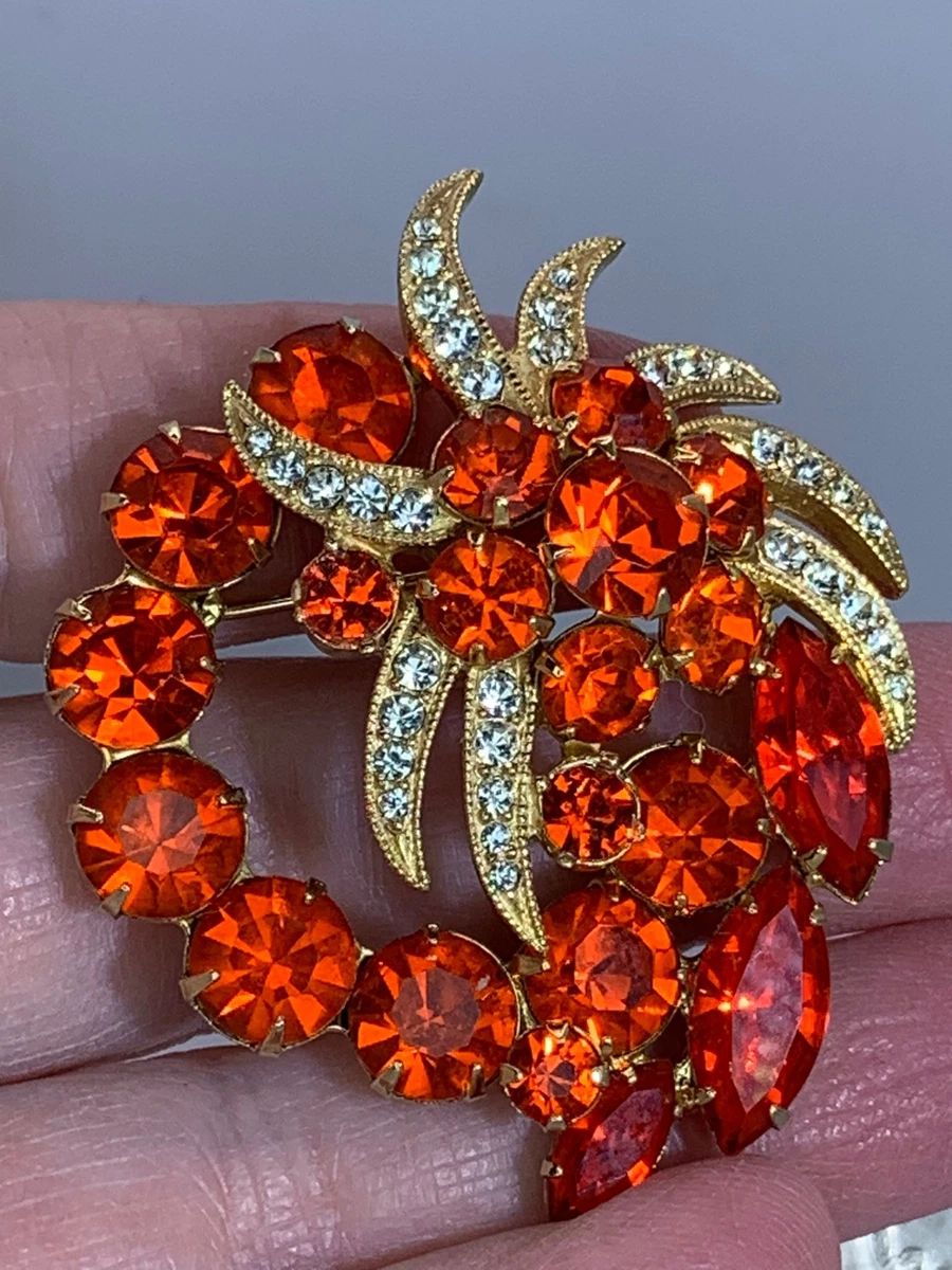 Orange brooch hotsell