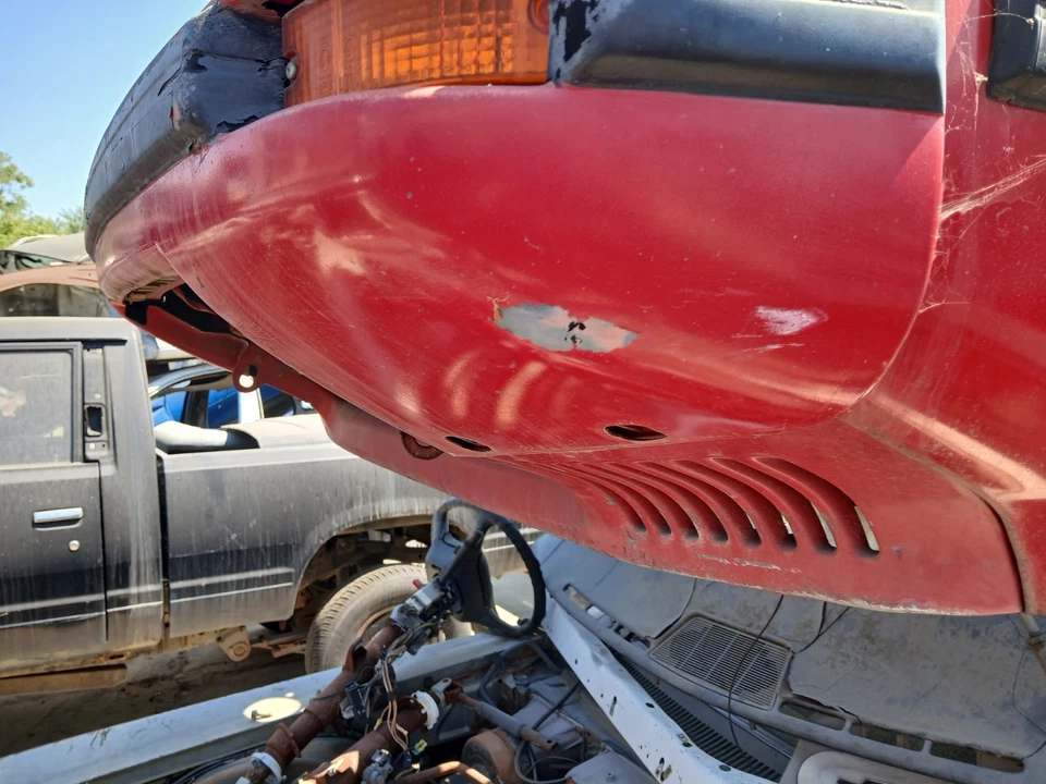 Parachoques delantero 83 RX7 FB MAZDA RX7 ROJO USADO 83 SIN CENEFA Foto 3 de 4