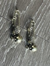Vintage gold tone, skeleton, safety pins ￼