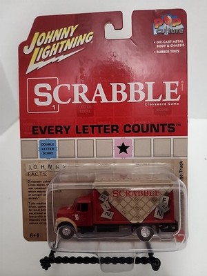 Johnny Lightning JLPC007 Pop Culture 1999 International Cargo Truck Scrabble