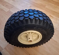 Archson 4.10/3.50-4 tubeless 2-Ply Tire & 1/2" Bore Plastic Wheel Excellent