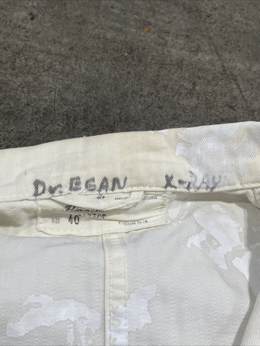 White vintage painters smock work wear with blue ink size 40, with visible collar tag reading “Dyer & Gray.”