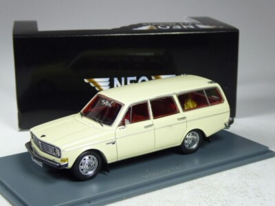 (KI-01-37) Neo Scale Models 43090 Volvo 145 Kombi weiß mit Hund in 1:43 in OVP