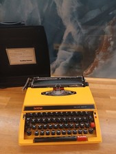 Machine a ecrire vintage brother deluxe 660tr jaune pop mallette  papier origine