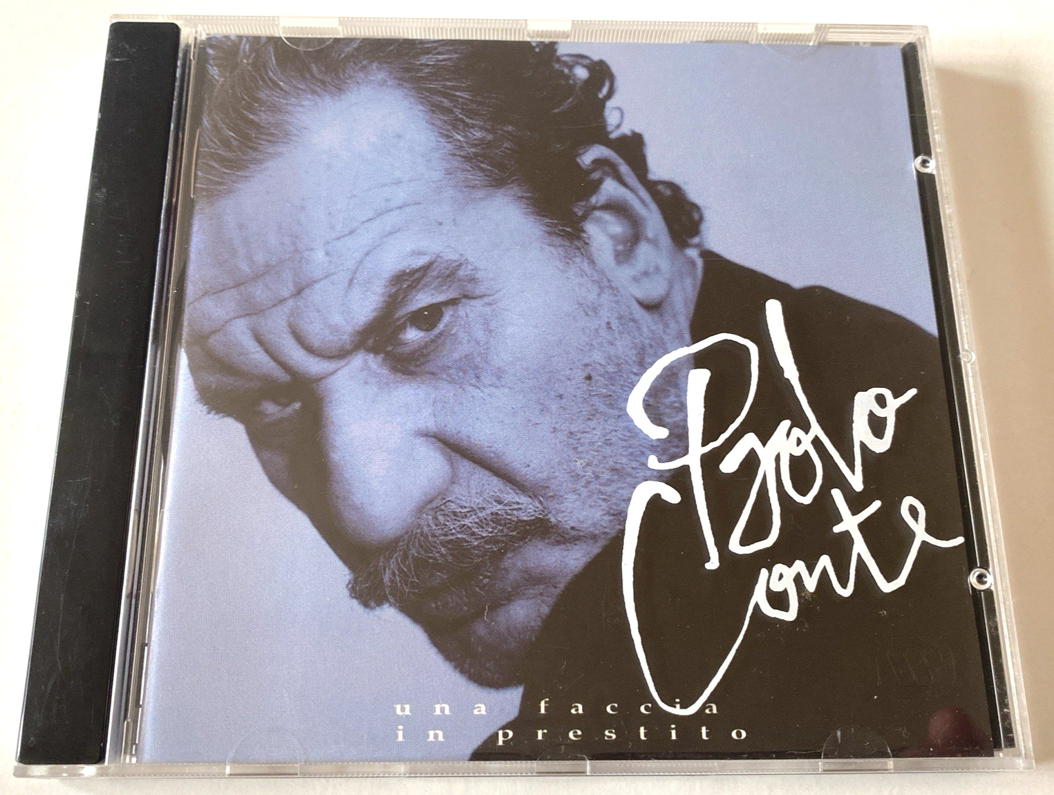 Paolo Conte – Una Faccia In Prestito EU CD Album 1995 CGD East West 17 Tracks