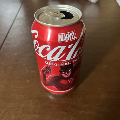 Opened, empty MARVEL limited edition DAREDEVIL Coke can