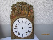 28.. ancienne facade et cadran d horloge comtoise