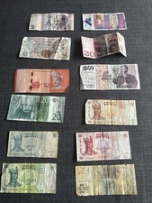 Large mixed world currency job lot – coins and banknotes from around the world.
