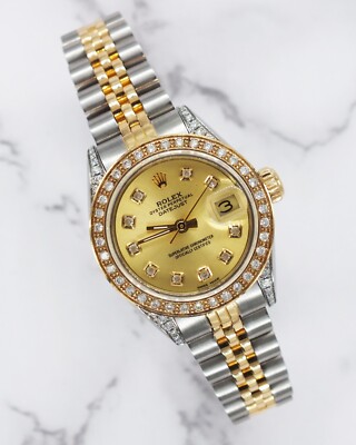 Ladies Rolex Datejust 69173 with Champagne Diamond Dial, Bezel and Shoulders.
