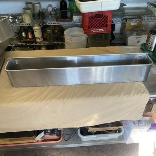 Used 34”L x 4.5”W x 5.5”H Stainless Steel Single Tier Speed Rail With 2 Keyholes