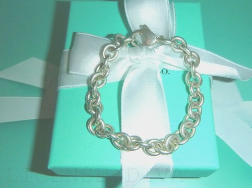 TIFFANY CHARM BRACELET STERLING 7.20 