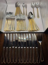65 PIECE SET SERVICE FOR 12 GOLD BEADED TRIM PLUME TIP STAINLESS CHINA FLATWARE