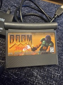 Atari Jaguar Console With DOOM Game.