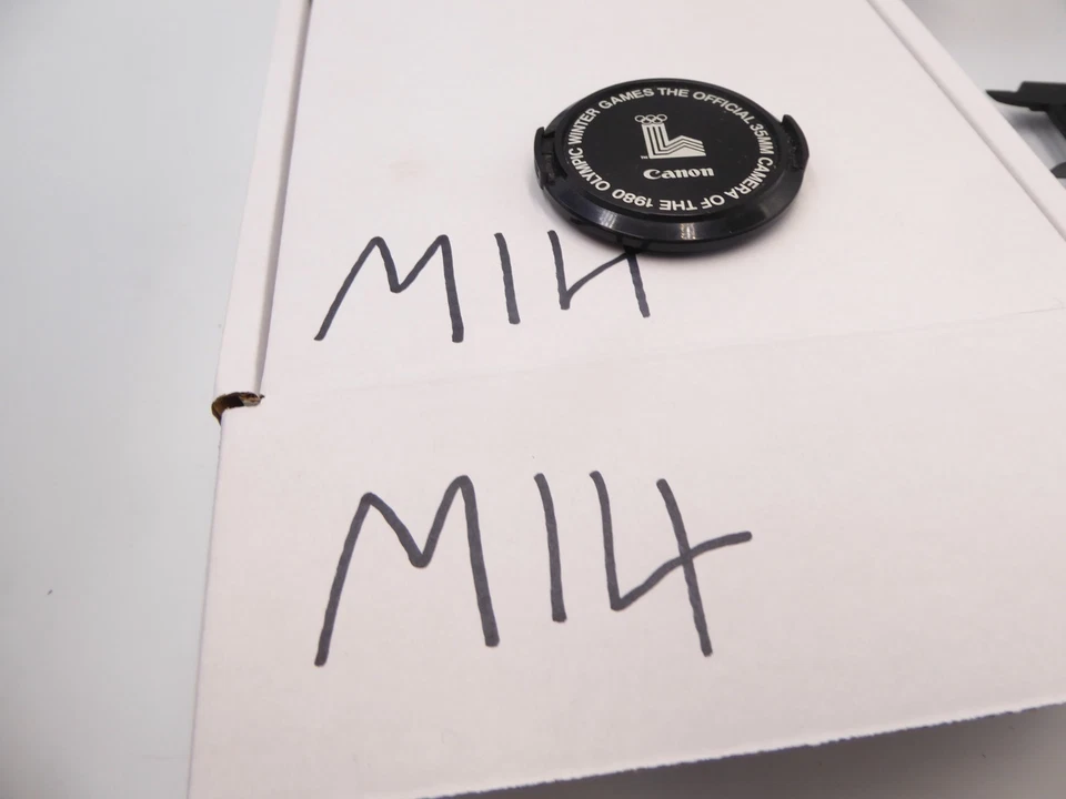 Canon genuine 35mm Camera of the 1980 Winter Olympic Games' C-52mm Lens Cap - Image 2 of 2