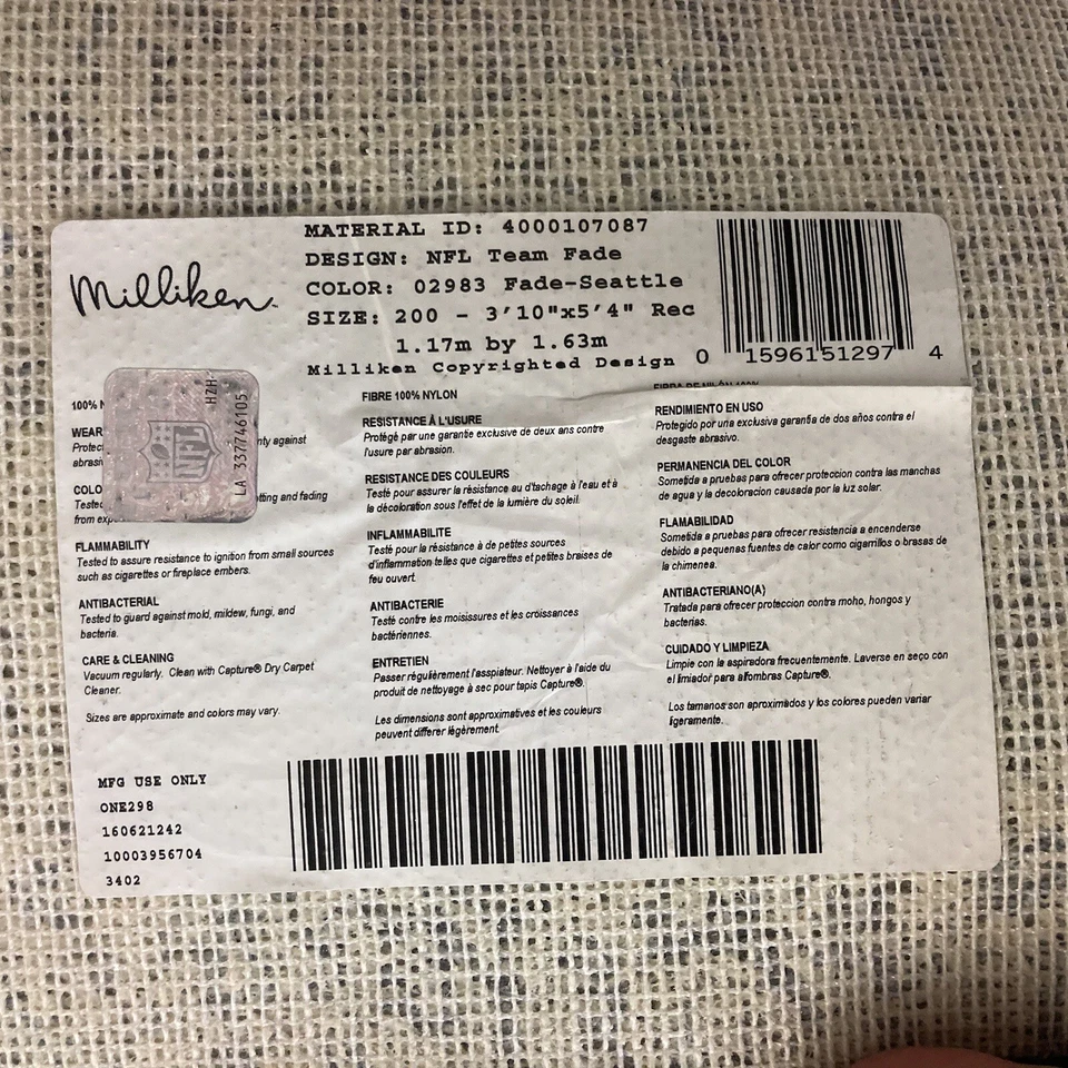 Alfombra cueva Seattle Seahawks hombre 3 pies 10 x 5 pies 4 Milliken NFL Team Fade 02983 Foto 3 de 4