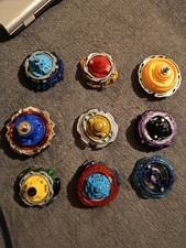 12 toupies Beyblade avec arène Canton Vaud